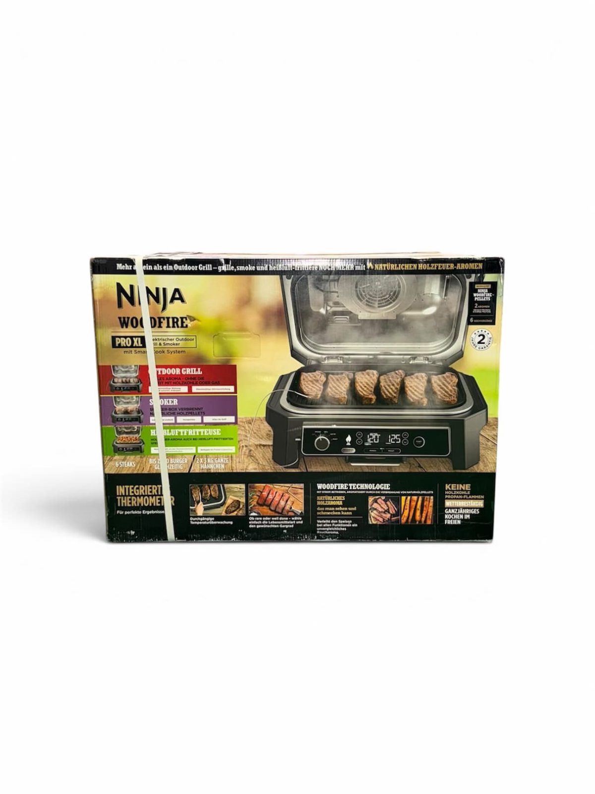 Prece ar Bojātu iepakojumu- Ninja Woodfire Pro XL elektriskais āra grils, melns